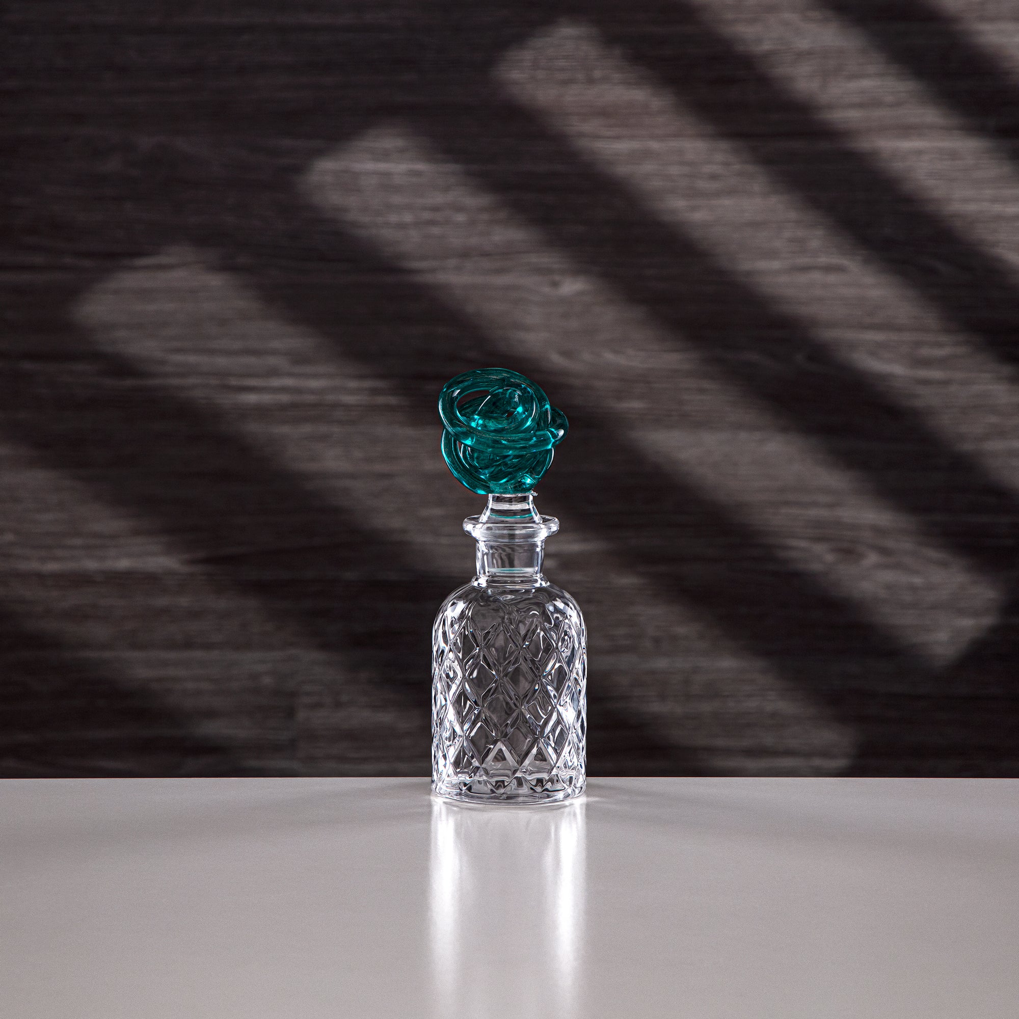 Almarjan Perfume Bottle Clear with Turquoise Knot
